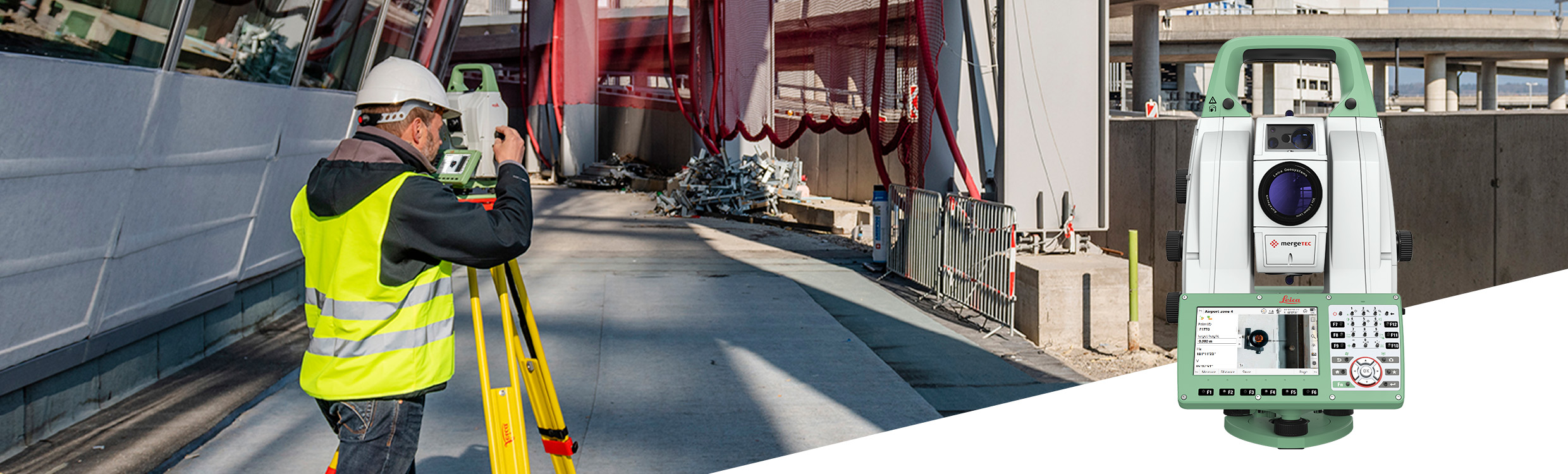 Surveyor measures with a robotic total station on a road infrastructure construction site.